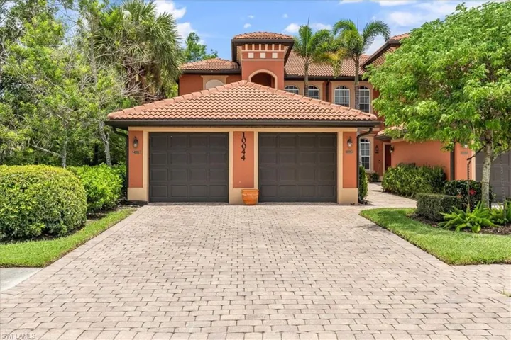 Featuring a detached garage that accommodates both a car and a golf cart!
