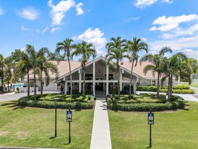 View of building exterior with driveway
