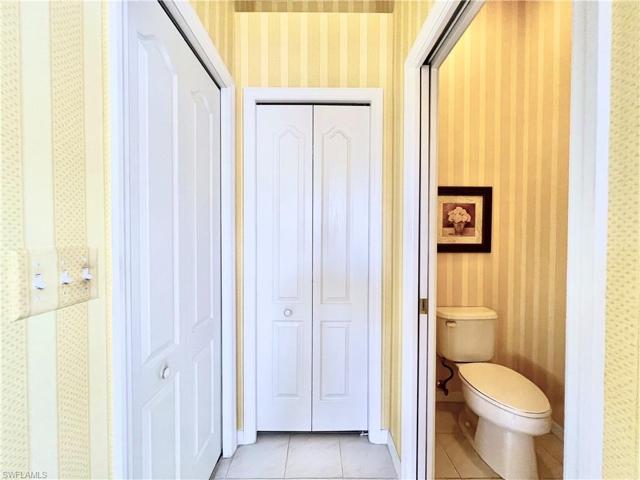 Separate water closet and linen closet