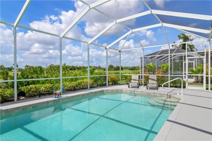 Pool featuring a patio and a lanai