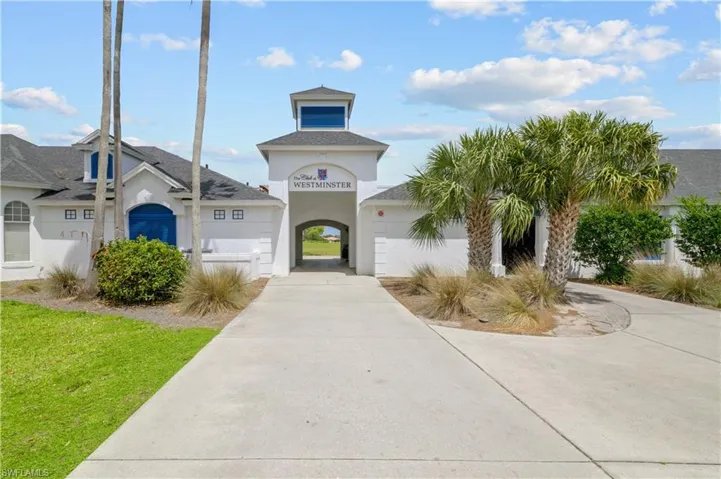 View of building exterior with driveway