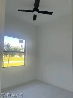Spare room featuring ceiling fan