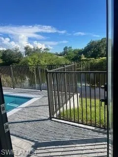Gate featuring a balcony