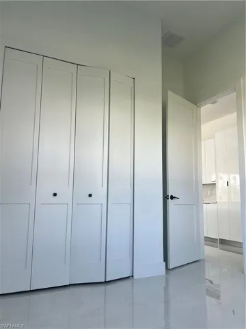 Unfurnished bedroom featuring a closet