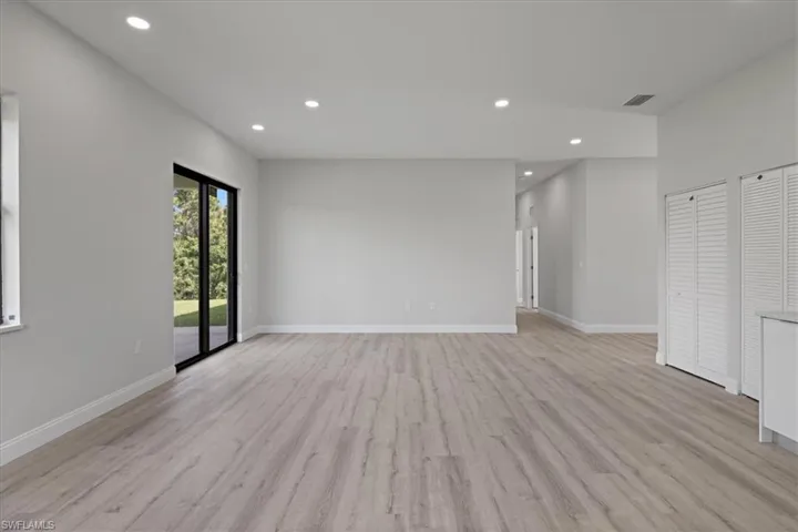 Spare room with recessed lighting and light wood finished floors