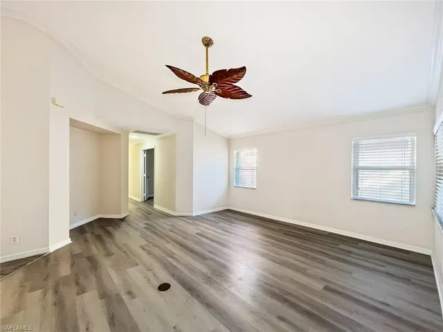 Living area looking toward hallway with den and 2nd bedroom