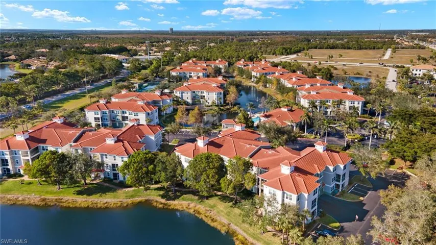 Aerial view of a large body of water and apartment complex