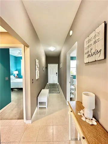 Hall with tile patterned floors