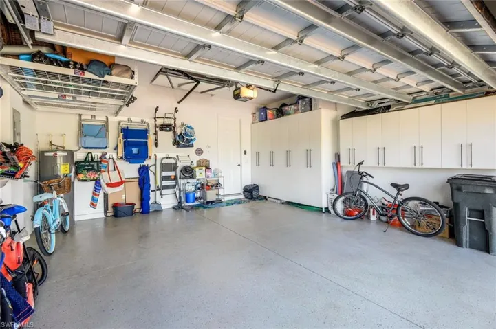 Two-car Garage with Custom Closets, Ceiling Storage and Gladiator Storage Track.