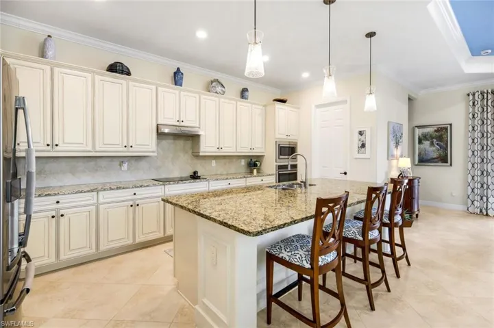 Large breakfast bar and plenty of work space.