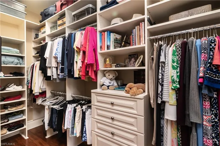 one of 2 walk in closets in master