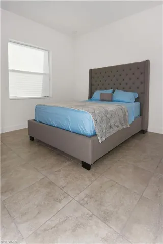 Bedroom with baseboards