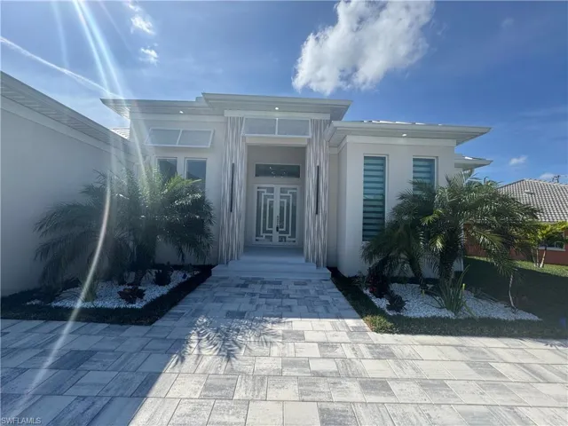Property entrance with french doors