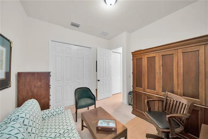 Office space with light colored carpet