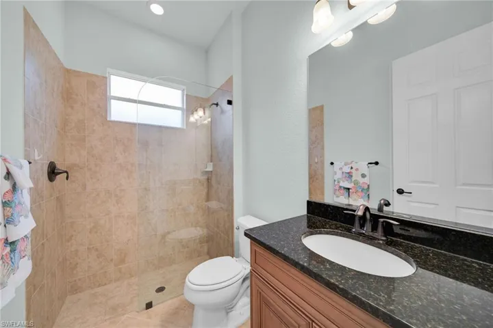 Full bath with vanity and walk in shower