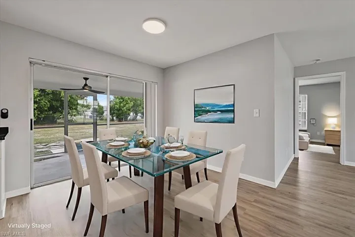 Dining area with light wood finished floors