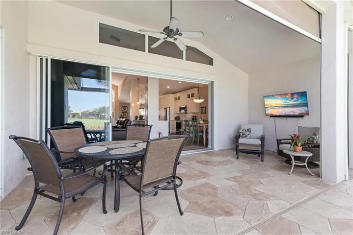 View of patio / terrace with a ceiling fan and outdoor dining space
