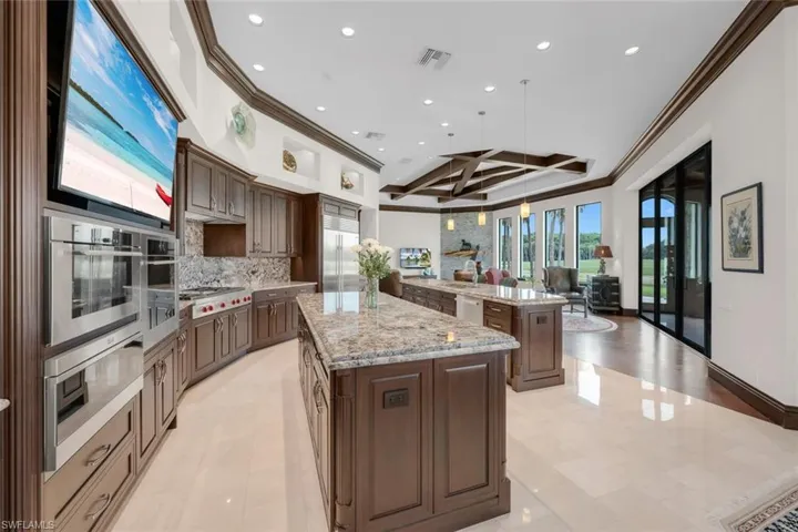 Kitchen with gas cooking on Wolf appliances