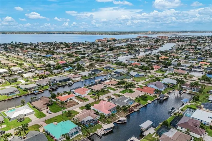 Expansive canal-front community featuring numerous residential properties