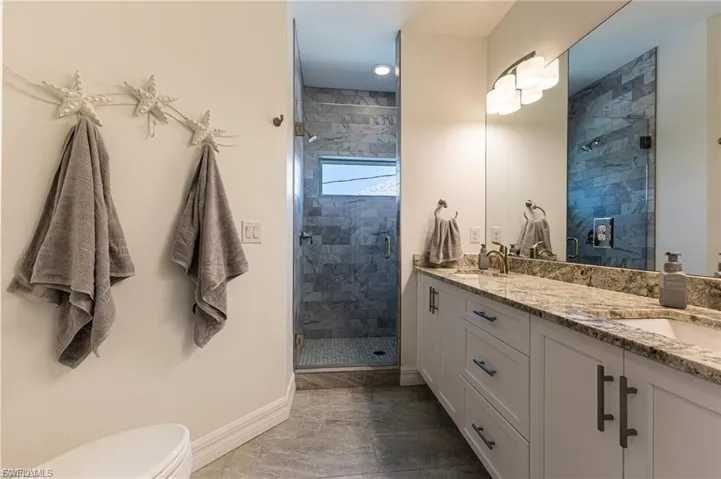Full bathroom with double vanity