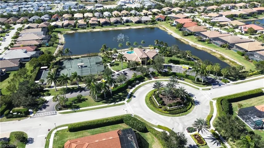 View of property location with a large body of water and nearby suburban area