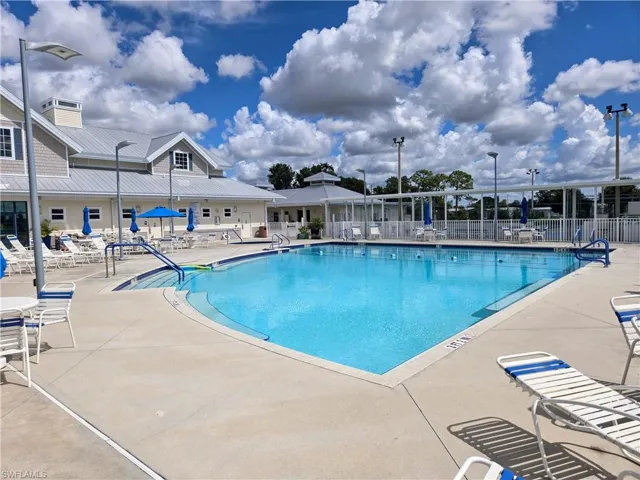 View of swimming pool with a patio