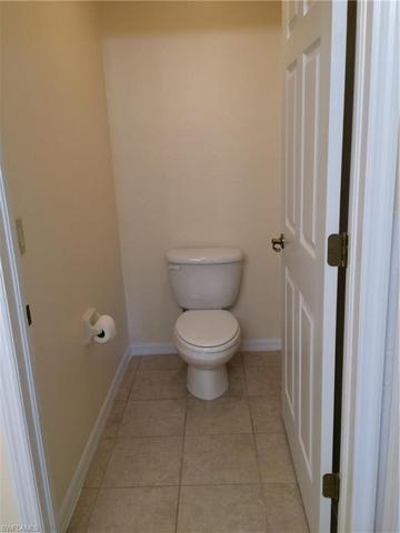 Separate commode with pocket door