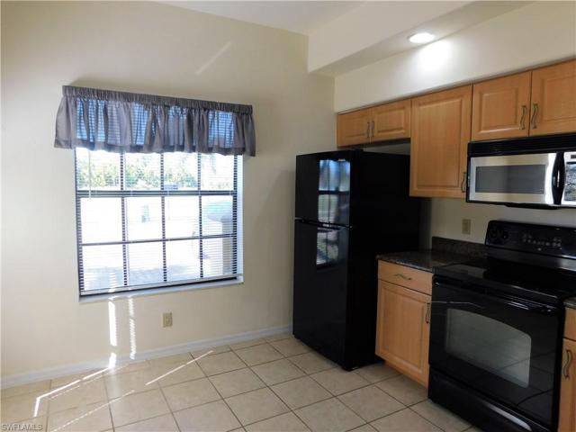 Tile Kitchen flooring with wood cabinetry.