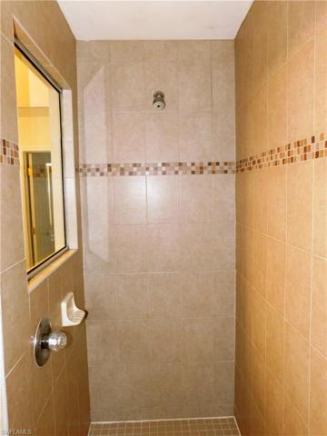 Walk in shower with decorative tile