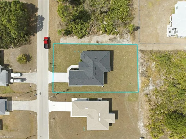 Aerial overview of property's location featuring property parcel outlined