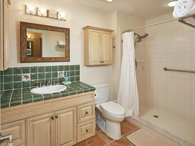 En suite bathroom with a HUGE walk-in shower.