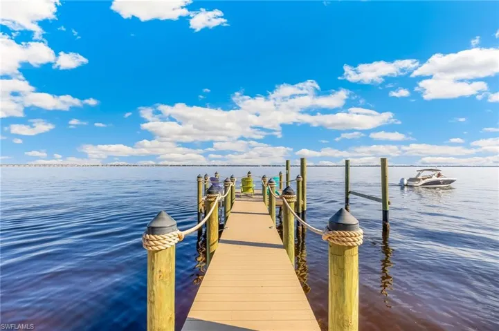 Dock featuring a water view