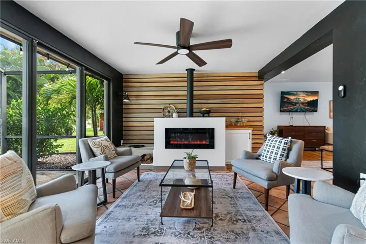 Living room featuring ceiling fan