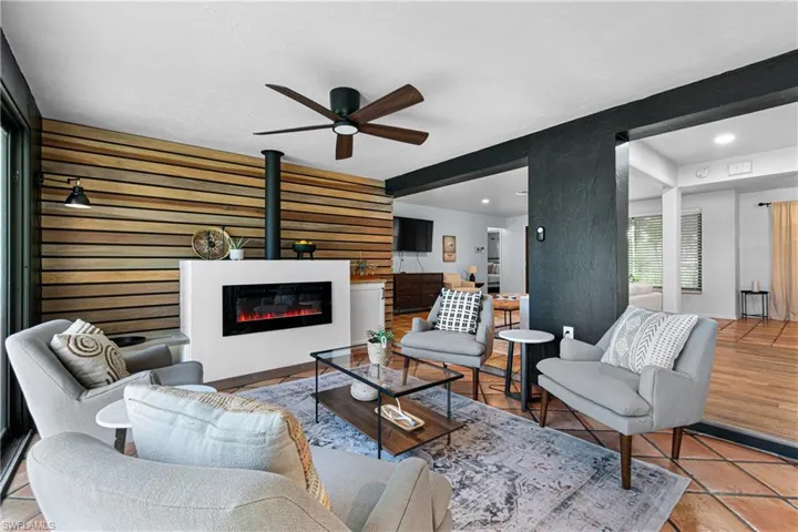 Tiled living room with ceiling fan