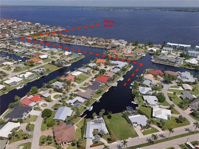 Aerial overview of property's location featuring nearby suburban area
