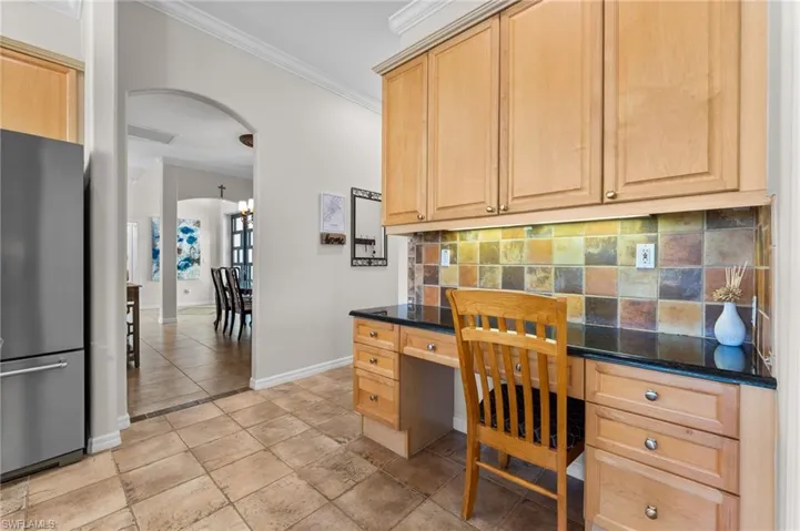 Built in Kitchen desk just off the formal dining and laundry space as you bring in your groceries from your car.