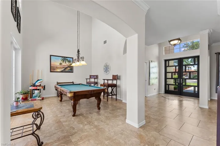 A 2 Story game room/living room. Currently used as the pool room