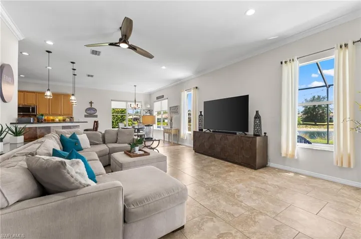 Recessed Lighting, Ceiling Fan and lots of natural light flood the 1st floor family room