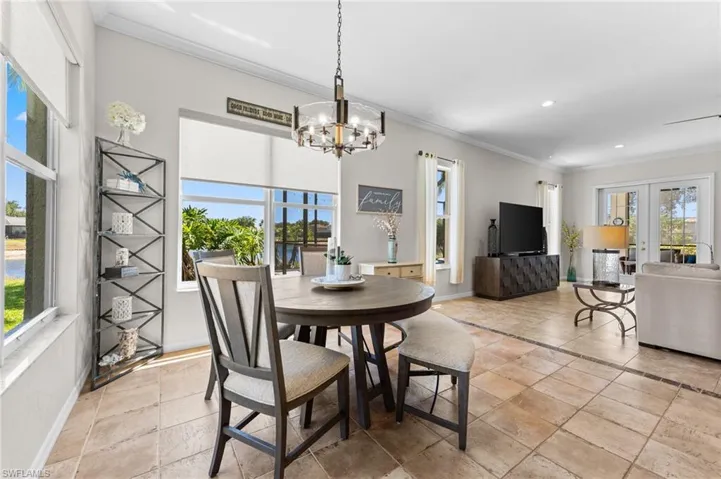 Breakfast Room with an abundance of light and views just off Kitchen and Family Room