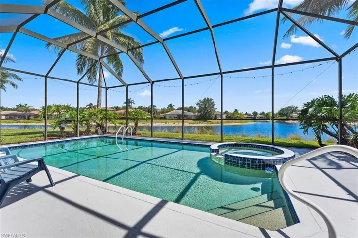 Live the dream in your private backyard oasis with private pool and spa with expansive pond views