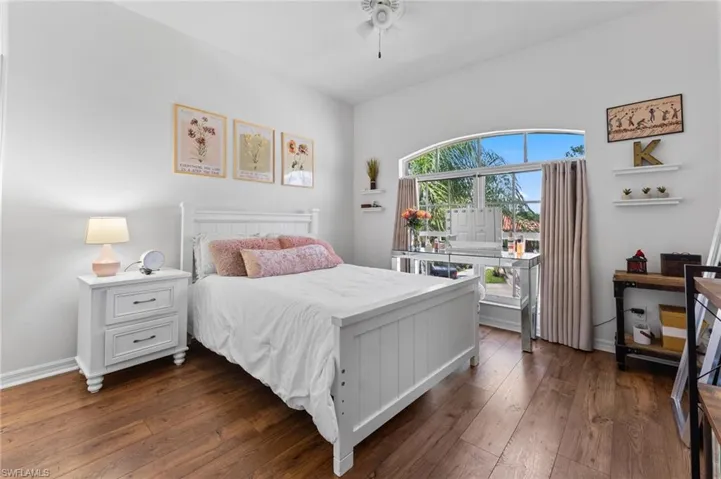 Pergo wood floors, transom window and cedar shelved closet