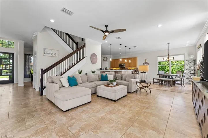 Family Room with an open floor plan, tile floors.