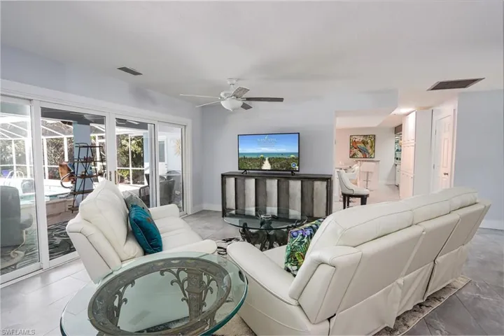 Tiled living room with ceiling fan
