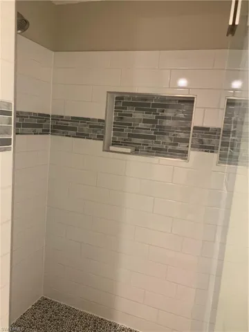 Details featuring tiled shower
