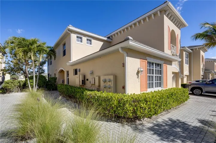 View of property exterior with stucco siding
