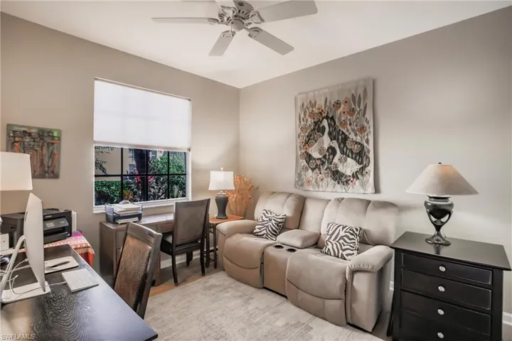 Office featuring light hardwood / wood-style flooring and ceiling fan
