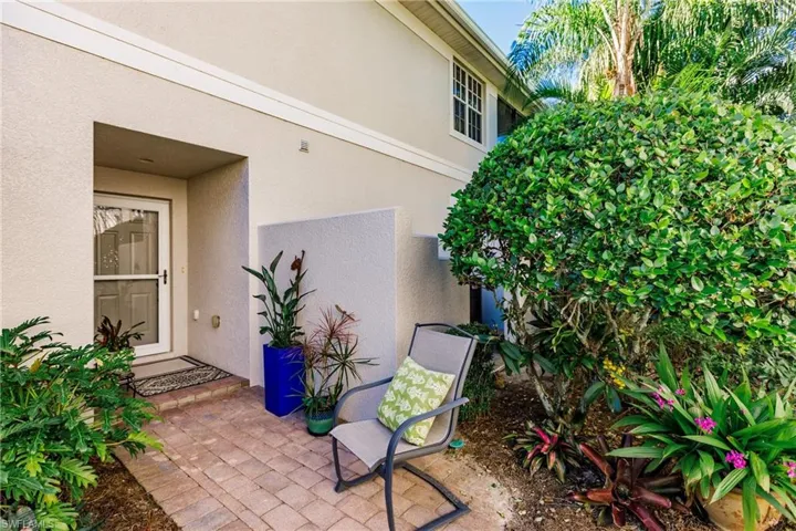 Doorway to property with a patio