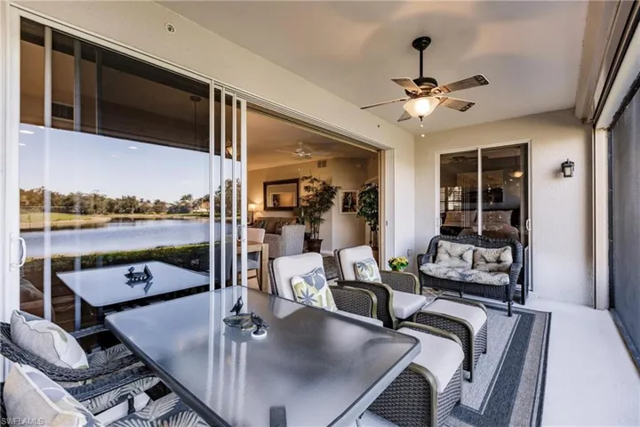 View of patio with a water view