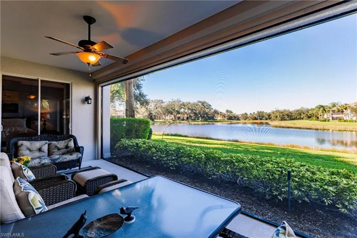 View of patio / terrace featuring ceiling fan, a water view, and an outdoor hangout area