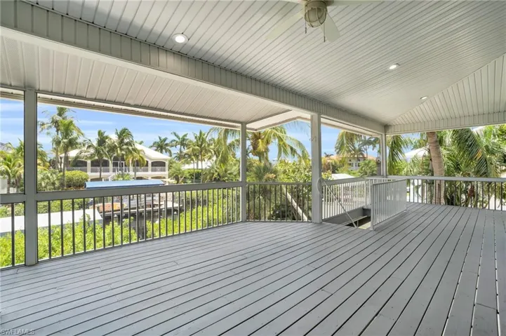 Wooden deck with ceiling fan